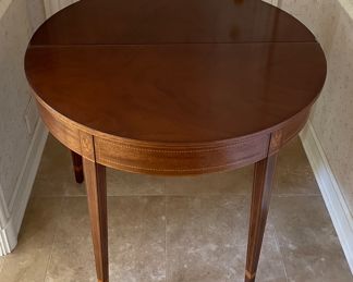 Caledonian Reproduction Mahogany Demi-Lune Flip-Top Game Table. Inlayed with Eagles. Measures 18"- 36" D x 29"H. Photo 3 of 4.