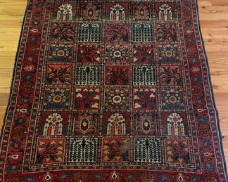 Vintage Persian Rug. Measures 4' 11" x 6' 5". Photo 1 of 4.