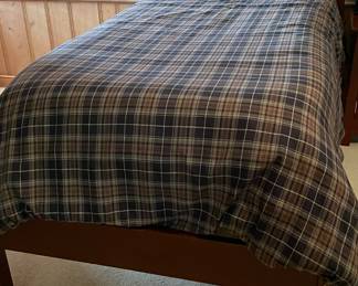 Pair of Robert Berglin Twin Bed Frames and Plaid Bedding.