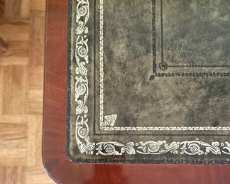 Caledonia English Reproduction Regency Style Mahogany Writing Table With Tooled Leather & Gilt Stenciled Top. Measures53" W x 30" D x 30" H. Photo 4 of 7.