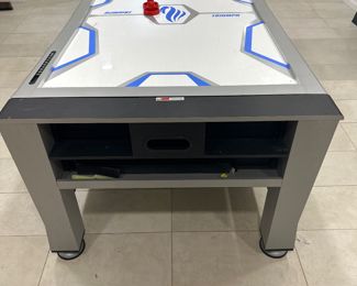 Triumph air hockey table with ping pong conversion. Damage to the right side. Can be repaired with a bracket or a brace still very usable. Selling as is.