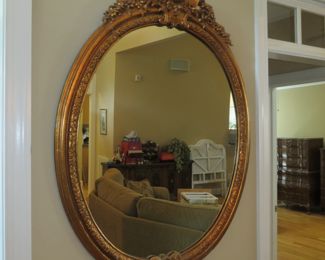 ORNATE BEVELED MIRROR.