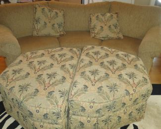 DOUBLE OTTOMANS WITH MATCHING PILLOWS.