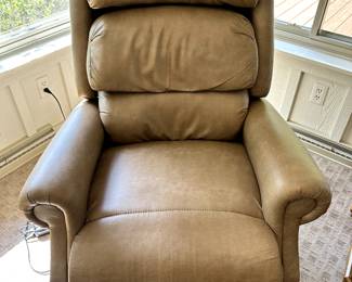 Fantastic  ULTRA COMFORT Leather Recliner that is waiting to help you relax! MANY Setting on this comfy chair! 