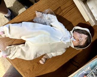 This little girl has bisque head, feet and hands! 