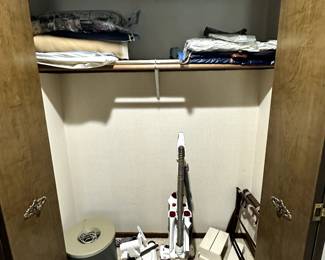Bedroom closet - we all have one that looks just like this! Terrific usable items! 