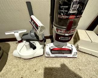 Bedroom closet - we all have one that looks just like this! Terrific usable items! This is a SHARK VACUUM WITH ACCESSORIES! 