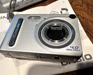 Casio EXILIM 4.0 Megapixel Camera with case and instructions and uploading dock!