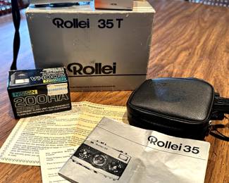 Super nice ROLLEI 35T 35MM camera. Original box, case, additional lenses, and instructions!