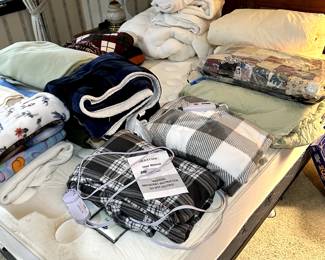 Blankets, Quilts, Heated Blankets, Mattress Covers and assorted bedding! 