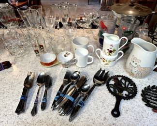 More silverware and assorted serving pieces! 