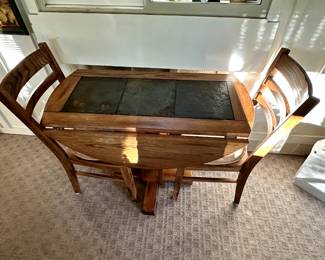 Sweet drop leaf table for two! Slate top with two chairs! 