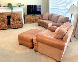 Leather and tweed sofa and matching oversized chair with ottoman.  Also a great pair of Southwest style upholstered chairs that swivel and rock.  
