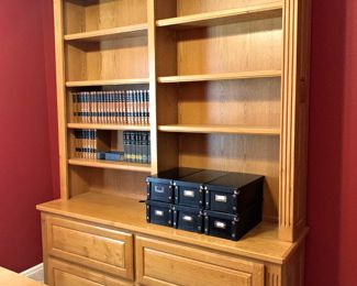 Quality oak double bookcase with drawers and adjustable shelves