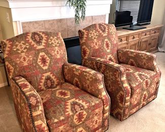 Southwestern style upholstered chairs that swivel and rock