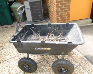 Here is a wheel barrow, done cutting and pasting descriptions about campers now.