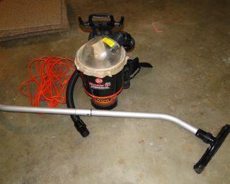 Hoover shoulder vacuum.  Cannot think of a better idea than to vacuum, with the vacuum strapped to your back.