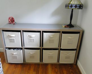 White washed wood, storage system complete with all the storage bins