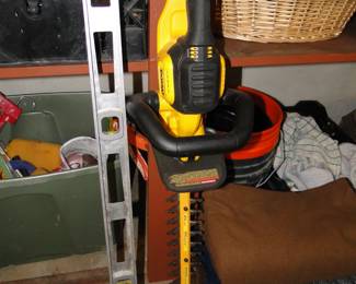 I'm gonna level with ya, on the left, that is one yellow hedge clippers