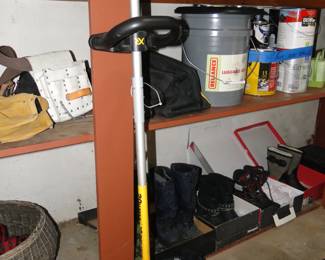 Boots, paint, and some yard equipment