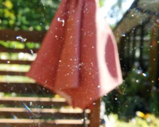 No, it's not a 1972 picture pick up at Photomat.  It is an umbrella