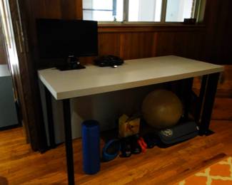 Very nice desk, with some outstanding exercise equipment
