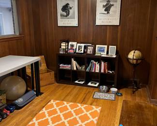 Globe, bookcase, and framed prints too