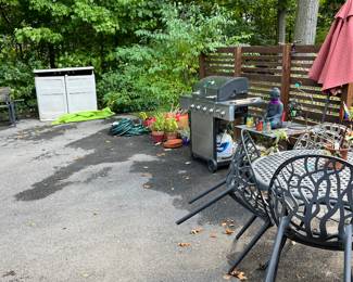 The driveway is filled with wonderful outdoor items as well