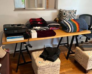 Blankets, pillows, bags, and footstools too.