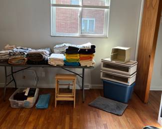 Lots of clean fresh towels, and lots of storage bins as well