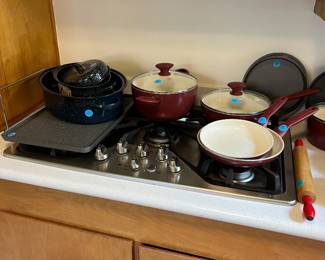 Pots and pans.  Green pans, in red