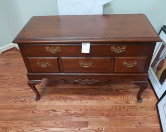 12     Lane cedar  chest  with  Queen  Anne legs.  There  is  also a  piece  of  glass  that  will cover the  top.             