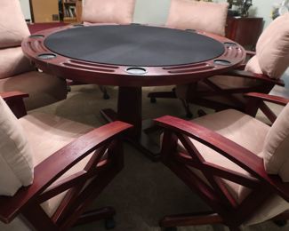 28.             Reversible  top  game  table.  it  is  54".  There  are  6  chairs.                 