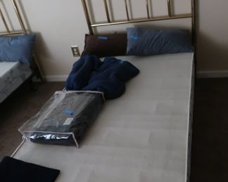 33             One  of  two  brass  twin  size  headboards  