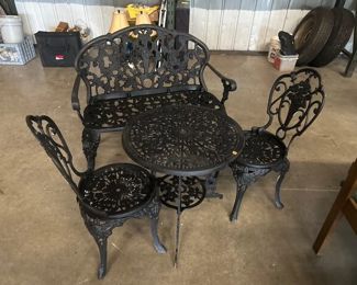 WROGHT IRON PATIO TABLE AND CHAIRS AND SMALL BENCH