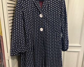 Vintage clothing, including raincoat with tiny umbrella-shaped polka dots 