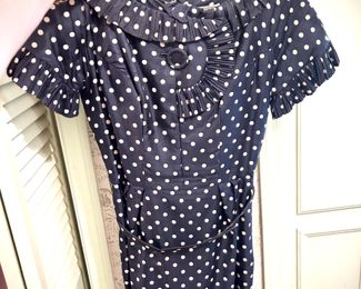 Vintage clothing, including black dress with polka dots