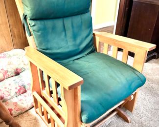 Wood rocker with book/magazine holders on either side