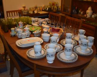 MCM Dining Room Suite by Lane Company, Alta Vista, consists of Beautiful Dining Room Table with leaf ( 80" in length), 6 Side Chairs, 2 Captain's Chairs - Gorgeous China Cupboard consisting of lighted China Cupboard and Buffet with 3 Center Drawers and Linen Fold Cupboard Doors on each side ( Immaculate!) The height is 6' 1 1/2") *plus* Warming Cart with Slide Open Top revealing porcelain food warming plate to keep those hot dishes hot and ready to serve.  The cart is 39 3/4" in length, 21" in depth, 30 1/2" high, Linen Fold Sliding Doors on Bottom and Wheels with "Brass Protectors". This Gorgeous Rare Lane Set will be offered as one complete unit to start with offers taken on individual pieces.