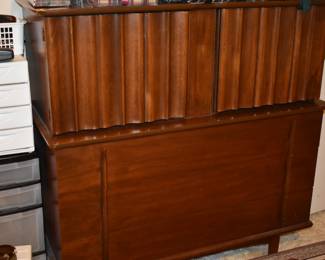 Mid Century Modern Walnut Bedroom Suite featuring Queen Bed with "brutalist" style Head Board, Large Mirrored Dresser with Linen Fold Side Doors with with 3 Pull Out Drawers on each side,  and 4 large Center Drawers, plus Fabulous Linen Fold Chest featuring Linen Fold top drawers opening  up to 4 Pull Out Drawers ( 2 to each side) with 3 large Dresser Drawers on the bottom, plus 2 Matching Beautiful Night Stands.