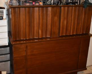 Mid Century Modern Walnut Bedroom Suite featuring Queen Bed with "brutalist" style Head Board, Large Mirrored Dresser with Linen Fold Side Doors with with 3 Pull Out Drawers on each side,  and 4 large Center Drawers, plus Fabulous Linen Fold Chest featuring Linen Fold top drawers opening  up to 4 Pull Out Drawers ( 2 to each side) with 3 large Dresser Drawers on the bottom, plus 2 Matching Beautiful Night Stands.