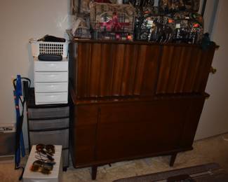 Mid Century Modern Walnut Bedroom Suite featuring Queen Bed with "brutalist" style Head Board, Large Mirrored Dresser with Linen Fold Side Doors with with 3 Pull Out Drawers on each side,  and 4 large Center Drawers, plus Fabulous Linen Fold Chest featuring Linen Fold top drawers opening  up to 4 Pull Out Drawers ( 2 to each side) with 3 large Dresser Drawers on the bottom, plus 2 Matching Beautiful Night Stands.