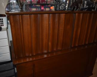 Mid Century Modern Walnut Bedroom Suite featuring Queen Bed with "brutalist" style Head Board, Large Mirrored Dresser with Linen Fold Side Doors with with 3 Pull Out Drawers on each side,  and 4 large Center Drawers, plus Fabulous Linen Fold Chest featuring Linen Fold top drawers opening  up to 4 Pull Out Drawers ( 2 to each side) with 3 large Dresser Drawers on the bottom, plus 2 Matching Beautiful Night Stands.