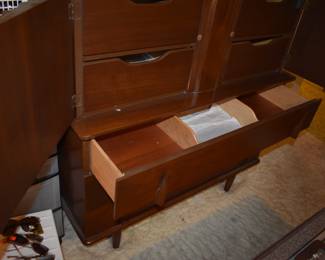 Mid Century Modern Walnut Bedroom Suite featuring Queen Bed with "brutalist" style Head Board, Large Mirrored Dresser with Linen Fold Side Doors with with 3 Pull Out Drawers on each side,  and 4 large Center Drawers, plus Fabulous Linen Fold Chest featuring Linen Fold top drawers opening  up to 4 Pull Out Drawers ( 2 to each side) with 3 large Dresser Drawers on the bottom, plus 2 Matching Beautiful Night Stands.