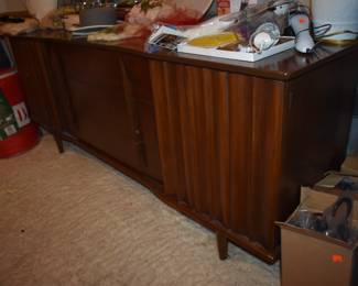 Mid Century Modern Walnut Bedroom Suite featuring Queen Bed with "brutalist" style Head Board, Large Mirrored Dresser with Linen Fold Side Doors with with 3 Pull Out Drawers on each side,  and 4 large Center Drawers, plus Fabulous Linen Fold Chest featuring Linen Fold top drawers opening  up to 4 Pull Out Drawers ( 2 to each side) with 3 large Dresser Drawers on the bottom, plus 2 Matching Beautiful Night Stands.