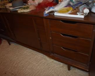 Mid Century Modern Walnut Bedroom Suite featuring Queen Bed with "brutalist" style Head Board, Large Mirrored Dresser with Linen Fold Side Doors with with 3 Pull Out Drawers on each side,  and 4 large Center Drawers, plus Fabulous Linen Fold Chest featuring Linen Fold top drawers opening  up to 4 Pull Out Drawers ( 2 to each side) with 3 large Dresser Drawers on the bottom, plus 2 Matching Beautiful Night Stands.