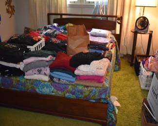 Loads of Collectible Bedding, Clothing and More atop this MCM Bed