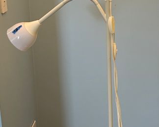 White floor lamp w/ arm 10”round x 69”h $18
2 available at $18 ea