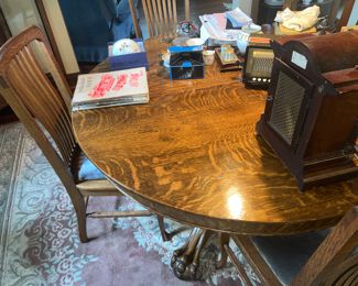 Gorgeous Tiger Oak with awesome base.. they don't make em like this anymore!  Weighs a ton! Mission Arts Crafts style with several chairs (6 I think) $450