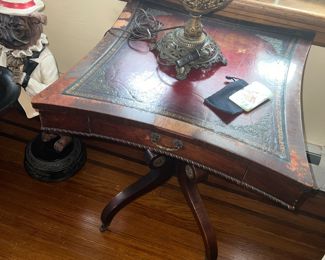 leather topped Victorian table with wear